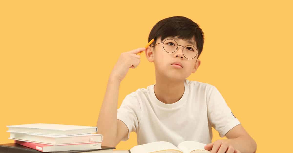 Primary student developing critical thinking skills during tuition lesson in Tampines