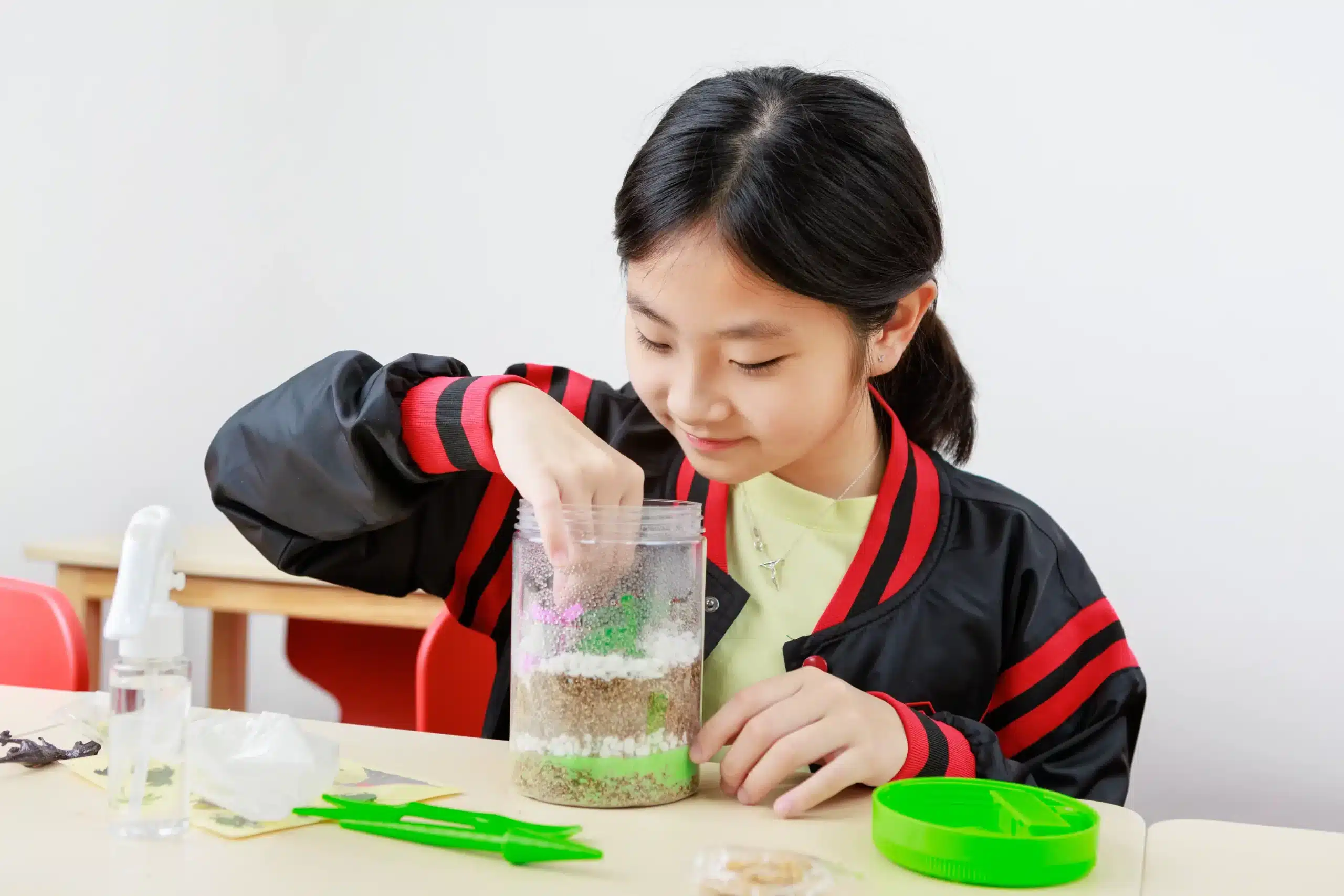 Student learning science hands-on experience